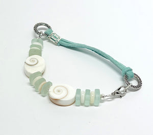 Simple and classic sea shell, leather, and frosted sea glass beads in mint green