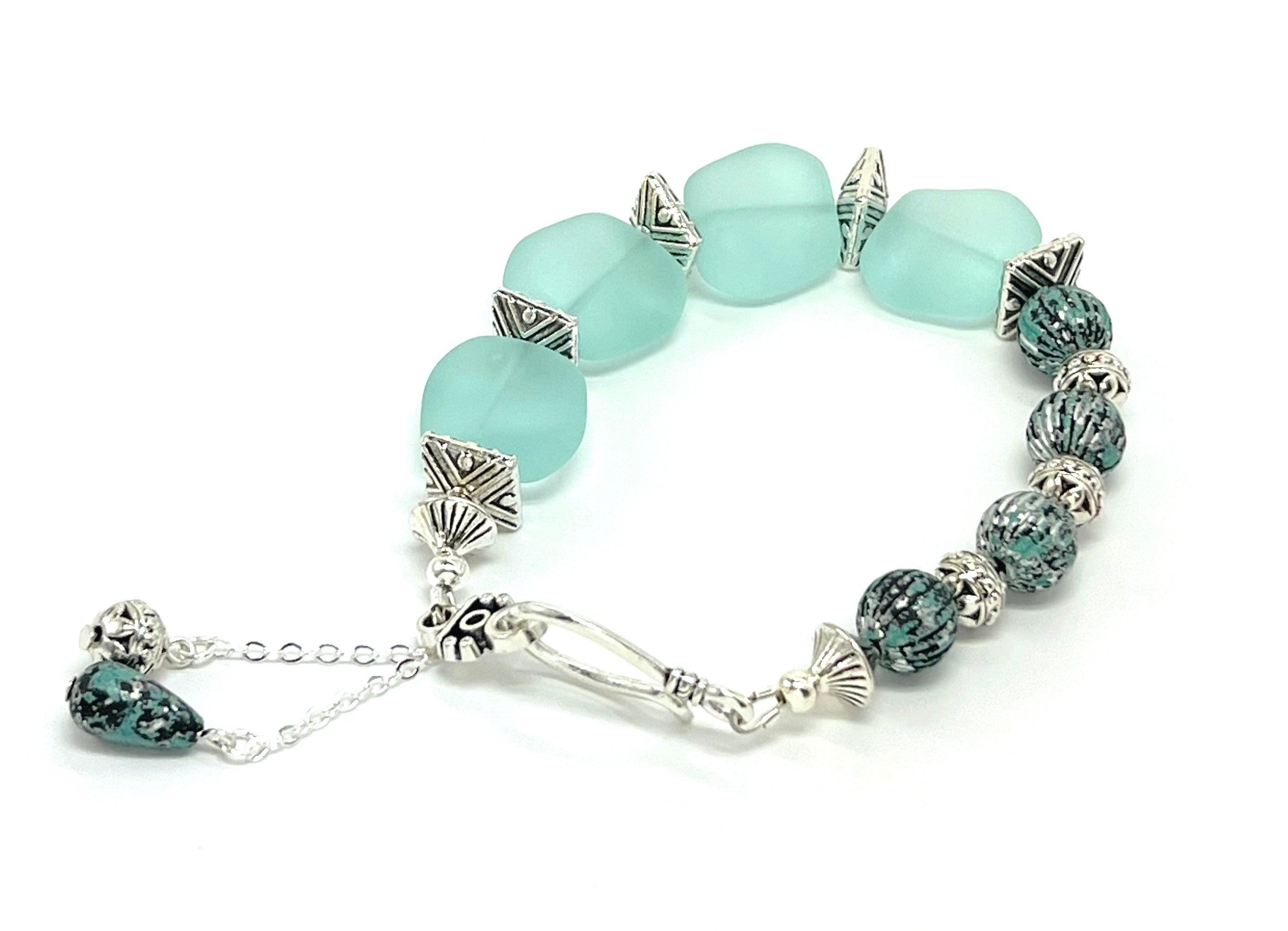 Ocean blue sea glass beads with blue and silver accents bracelet and earring set