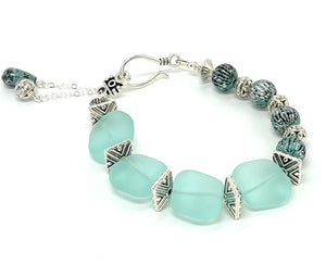 Ocean blue sea glass beads with blue and silver accents bracelet and earring set