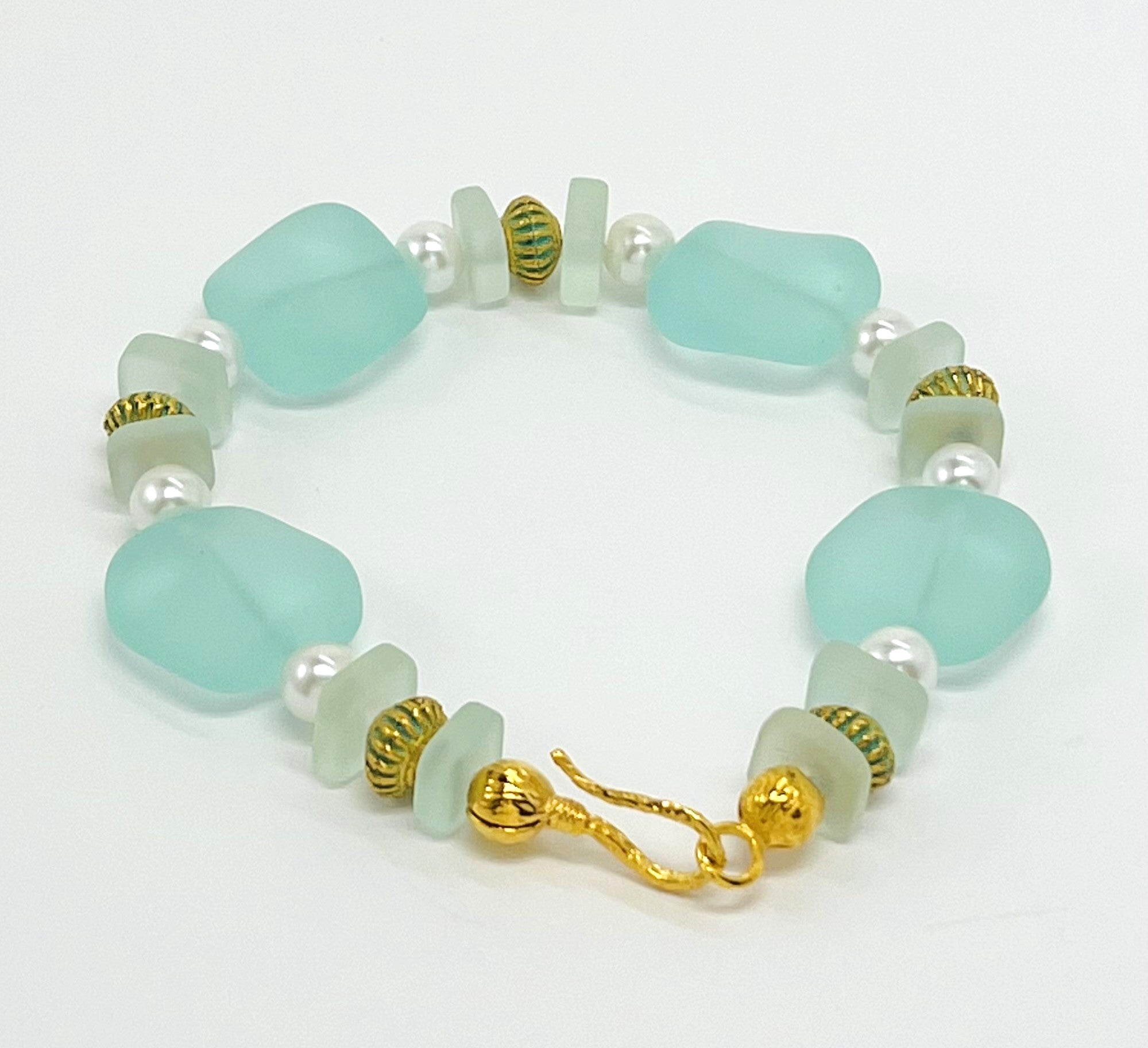 Beachy aqua sea glass look with glass pearls and gold plated accents