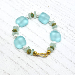 Beachy aqua sea glass look with glass pearls and gold plated accents