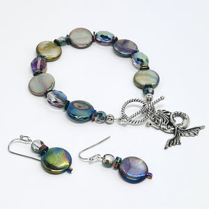 Mermaid bracelet reflecting iridescent aurora borealis shell coin beads with complementing cut glass