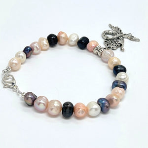 Multicolor fresh water pearls adorned with silver plated mermaid charm