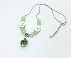 Beachy frosted mint sea glass and spiral shells necklace and earring set with a cute ceramic green turtle dangle