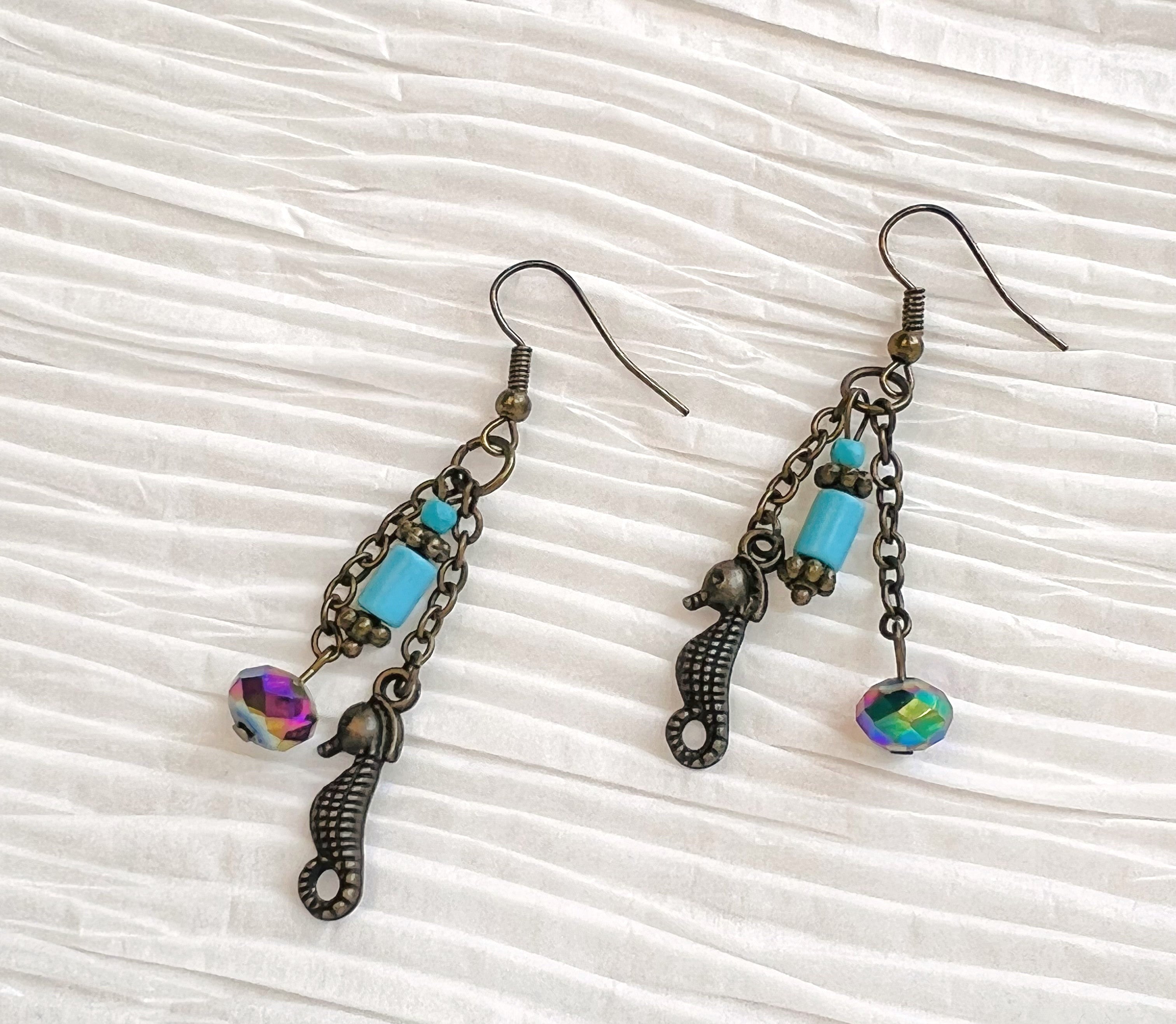 Seahorse earrings with turquoise and rainbow colored glass beads with antique brass ear wires