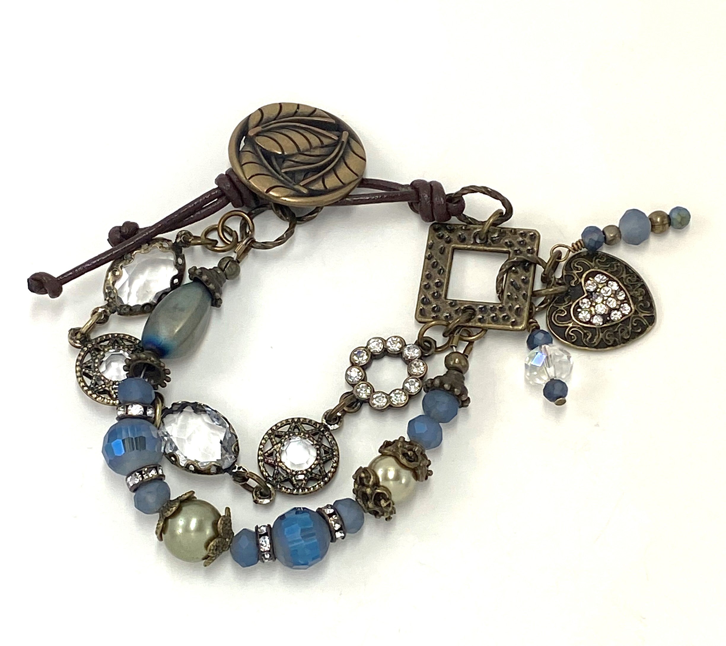 Enchanting double strand antique brass bracelet with glass beads and leather closure