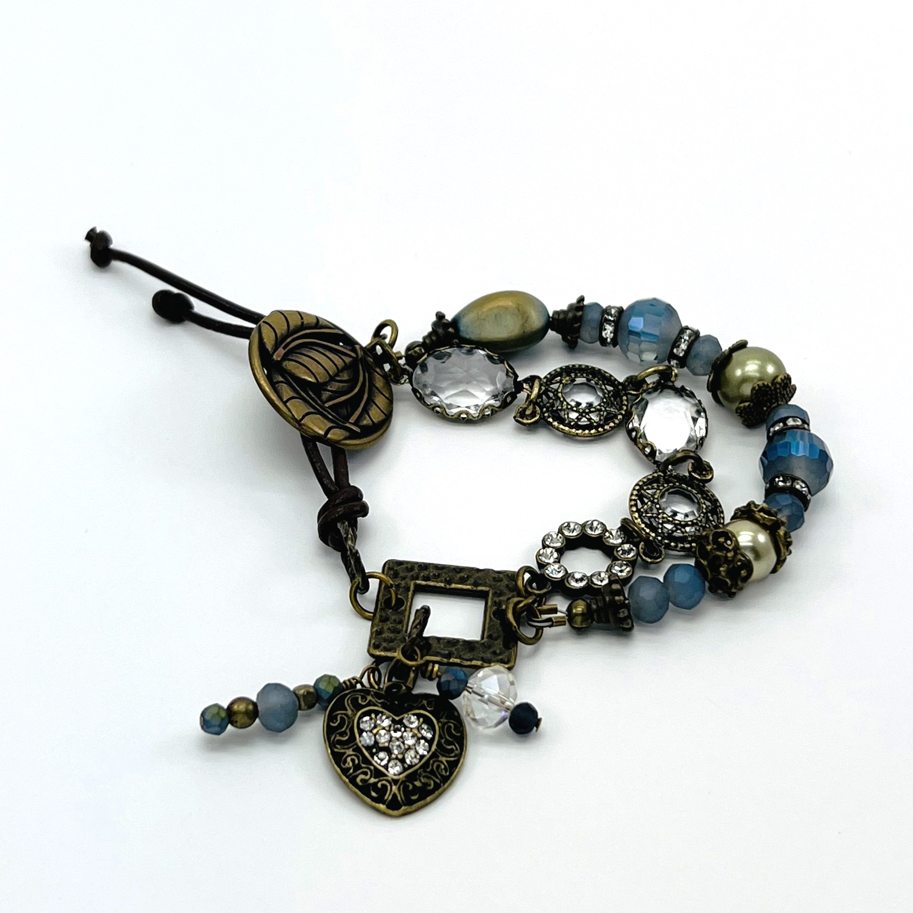 Enchanting double strand antique brass bracelet with glass beads and leather closure