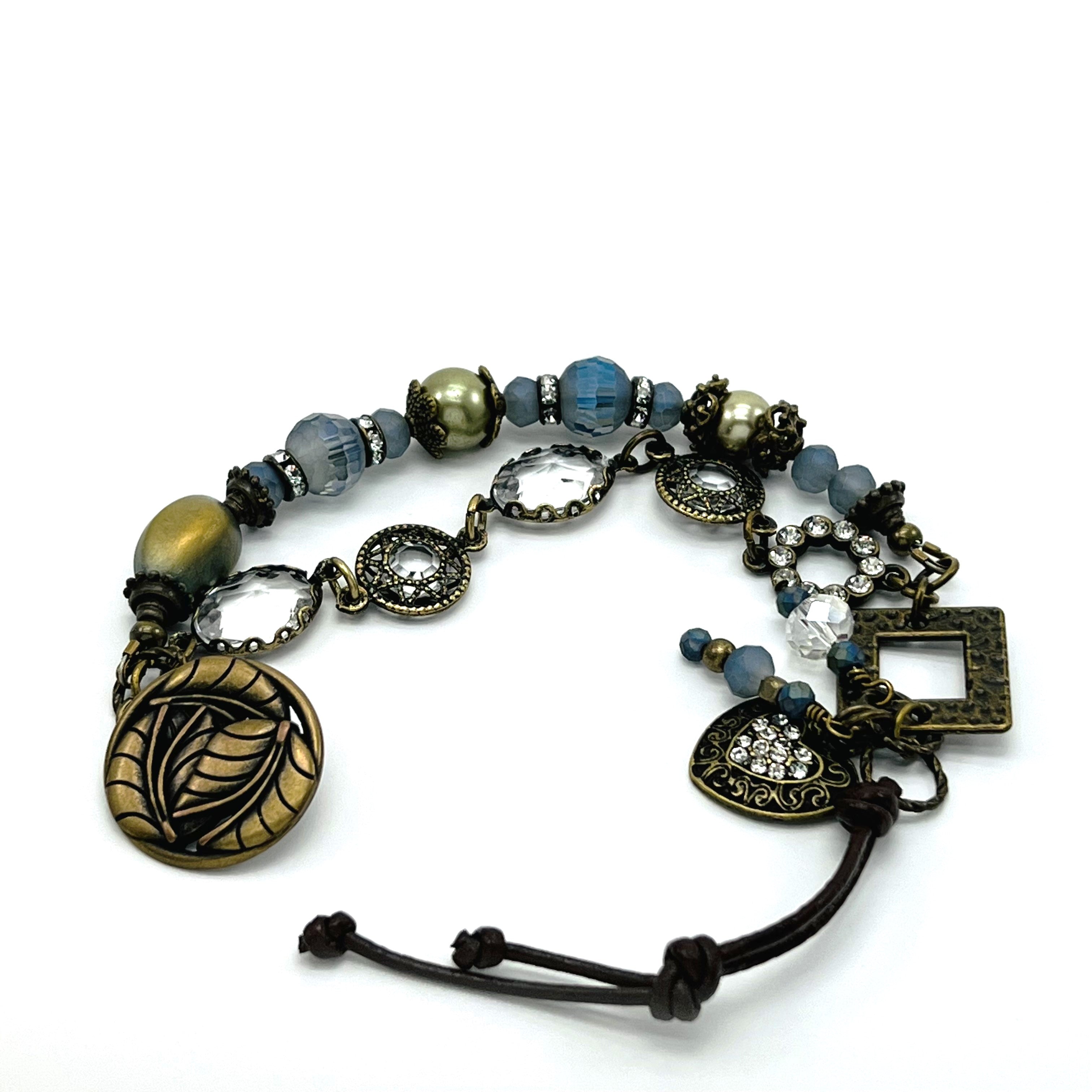 Enchanting double strand antique brass bracelet with glass beads and leather closure