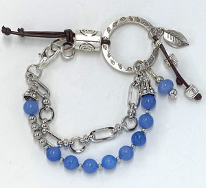 Spirited double strung silver plated, cool blue glass beaded bracelet and earring set