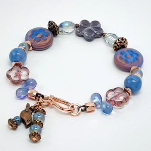 Czech glass bracelet and earring set with blue and peach flower beads, fire agate, copper bird and accents