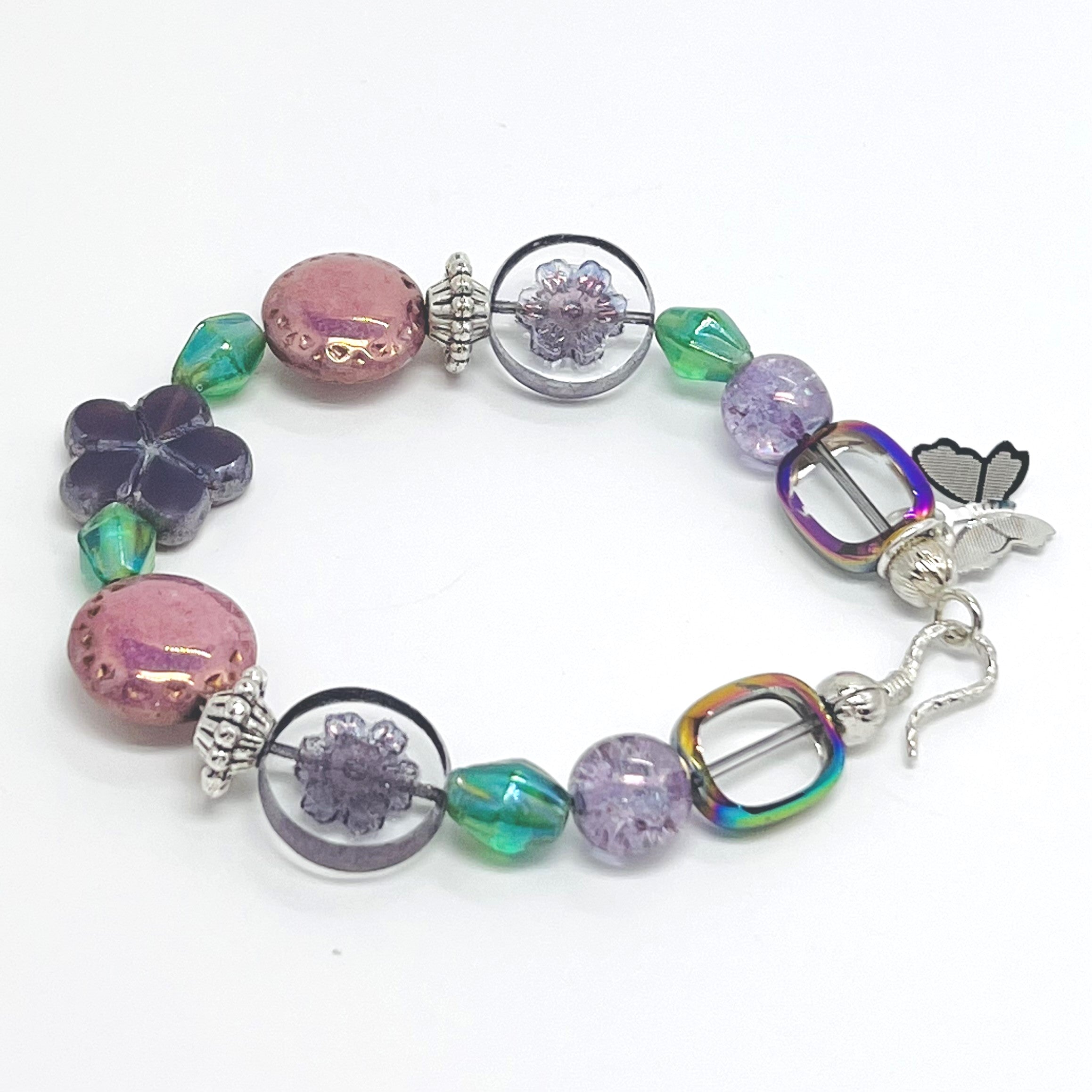 Romantic bracelet and earring set with Czech beads, glass beads in purple, pink and green with a silver butterfly dangle and silver accents