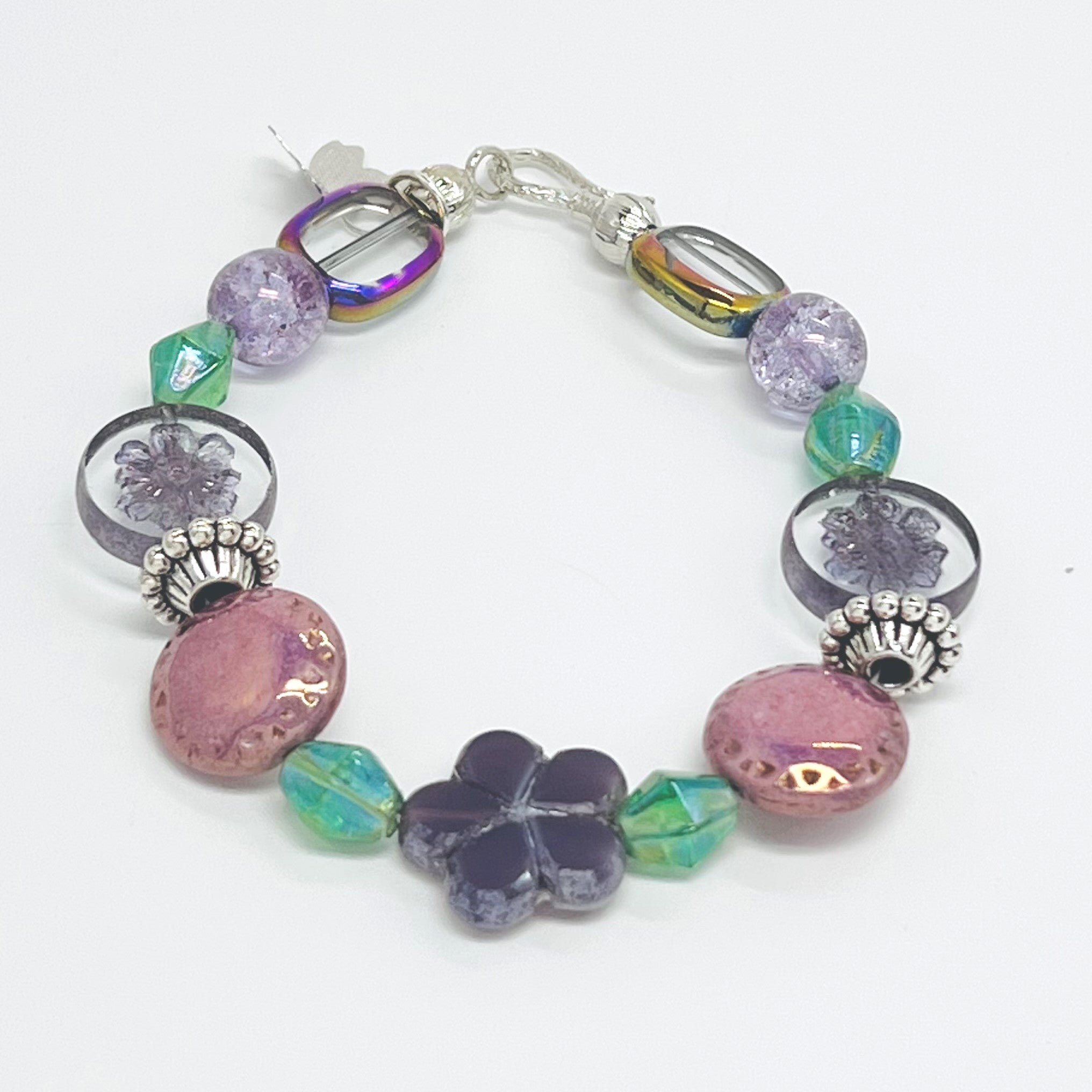 Romantic bracelet and earring set with Czech beads, glass beads in purple, pink and green with a silver butterfly dangle and silver accents