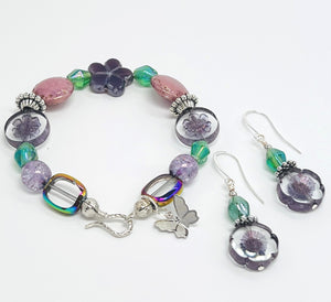 Romantic bracelet and earring set with Czech beads, glass beads in purple, pink and green with a silver butterfly dangle and silver accents