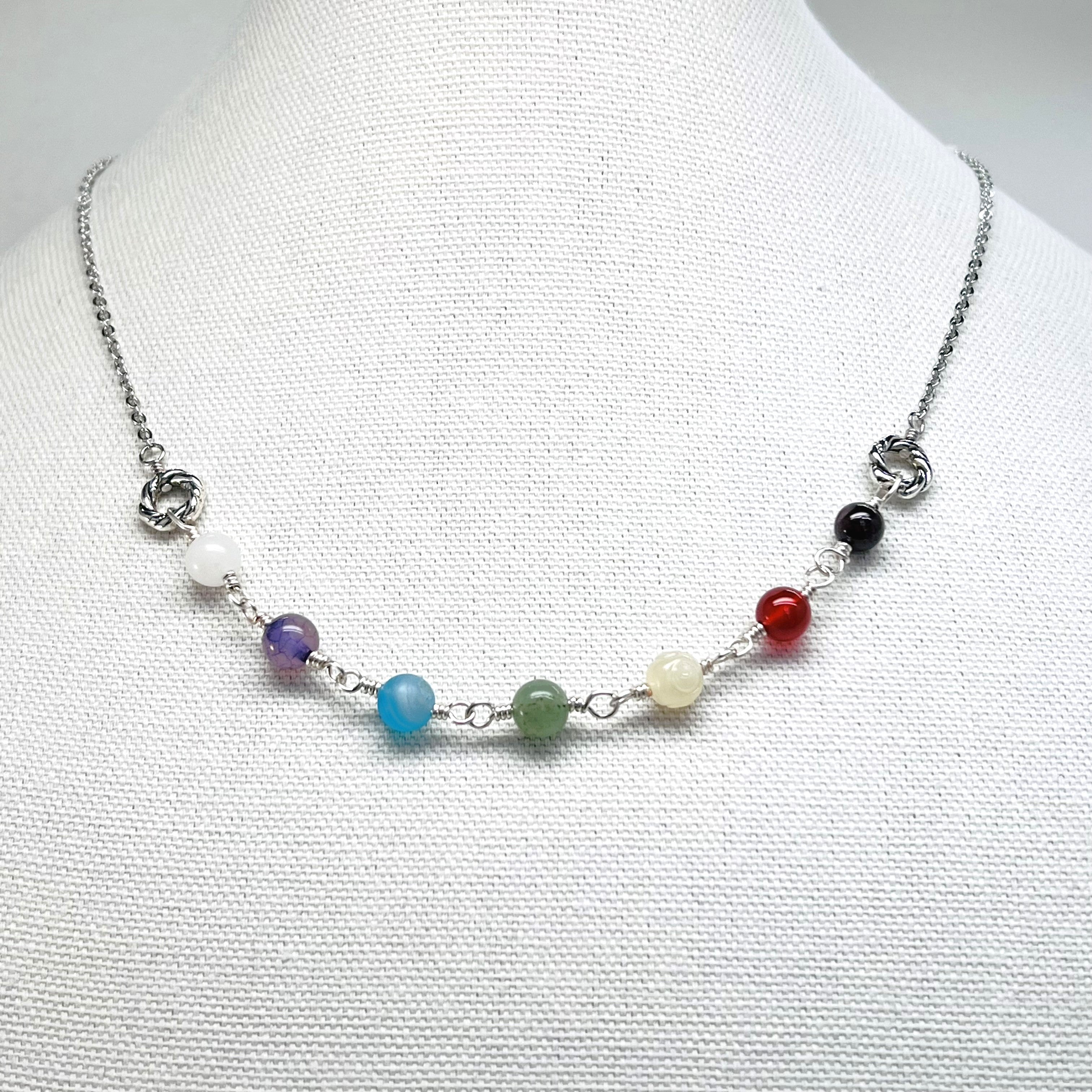 Chakra gemstones and silver necklace