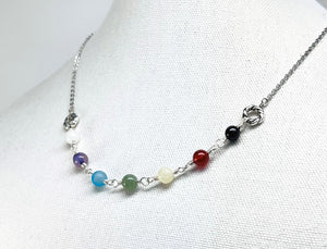 Chakra gemstones and silver necklace