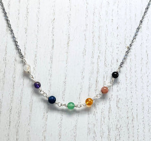 Chakra gemstones and silver necklace and earring set