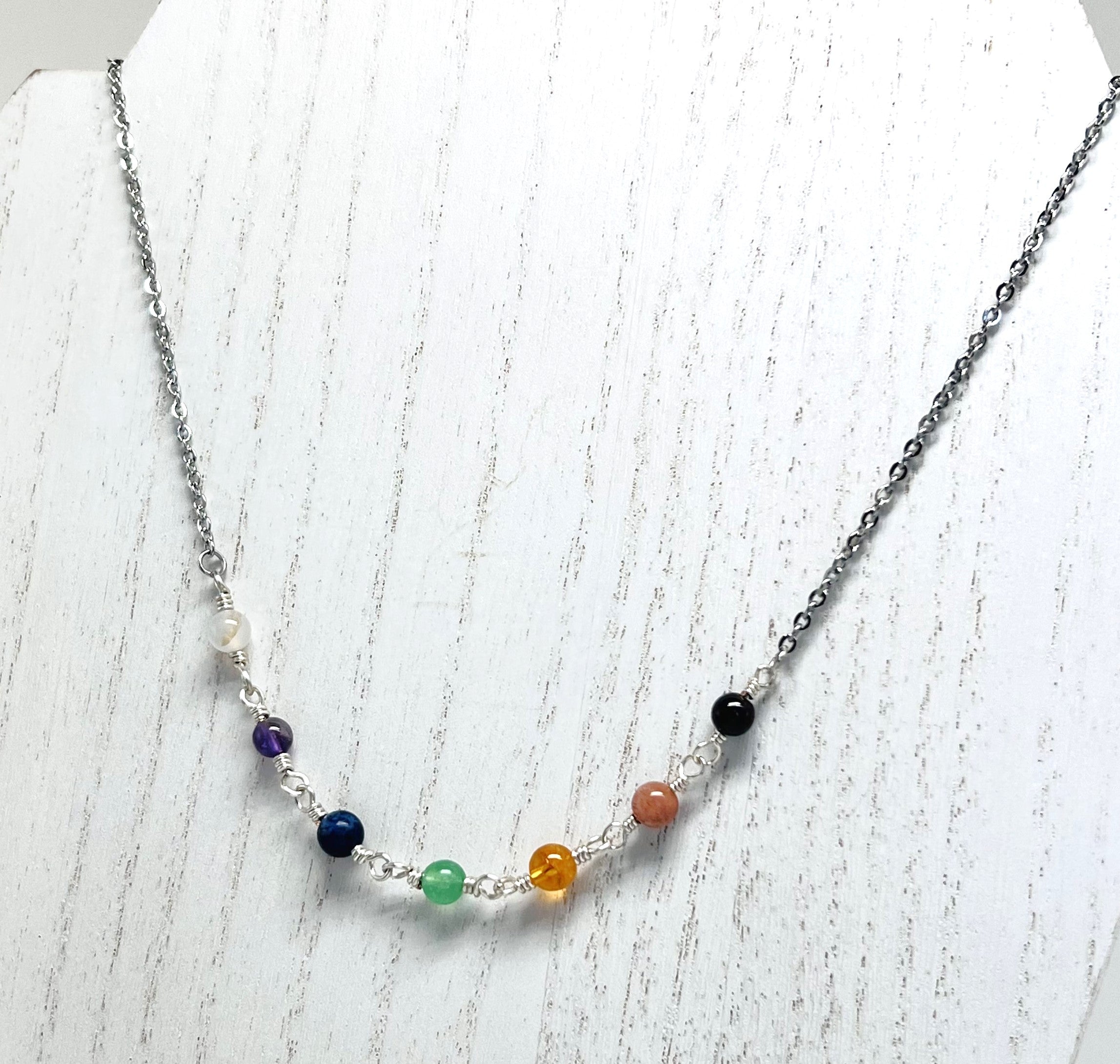 Chakra gemstones and silver necklace and earring set