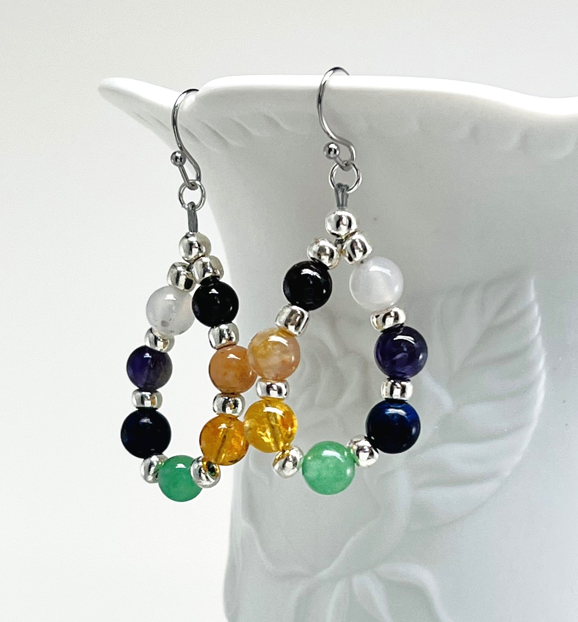 Chakra gemstones and silver necklace and earring set