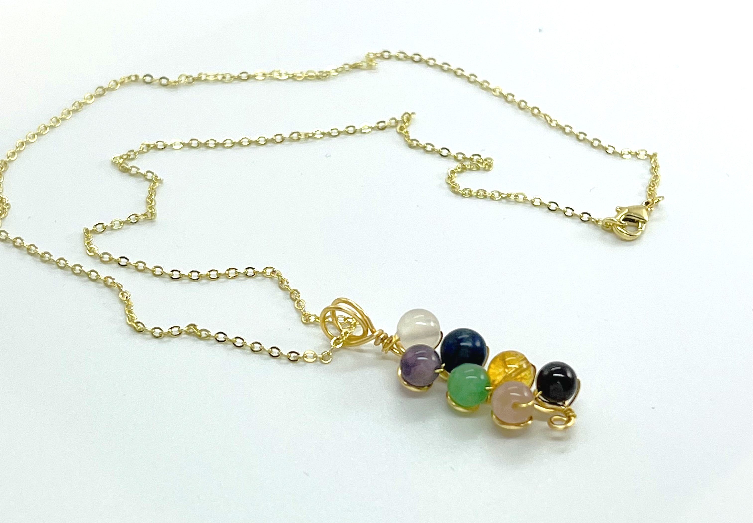 Chakra necklace 7 gemstones on gold plated chain