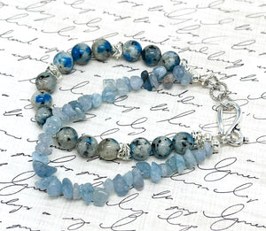 Peace and goodwill abound with this lovely Aquamarine and a Afghanite (K2) stone bracelet and earring set