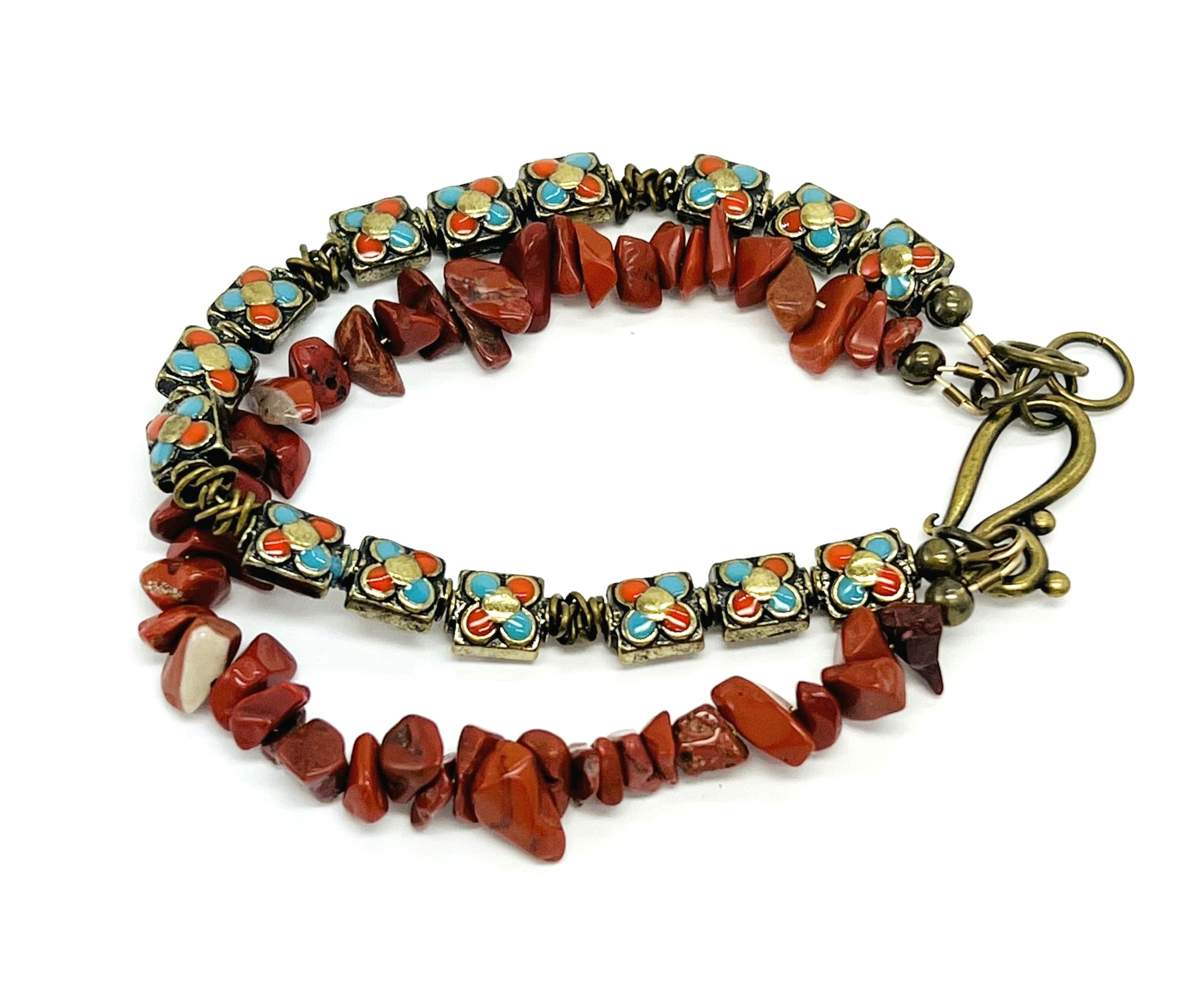 Red jasper chips and turquoise and gold enameled beads in this stunning bracelet and earring set