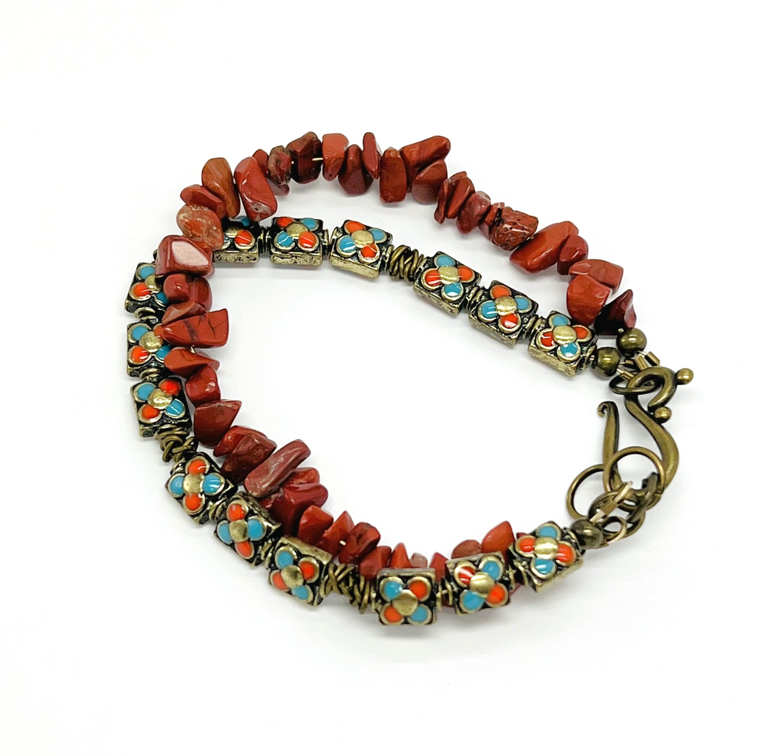 Red jasper chips and turquoise and gold enameled beads in this stunning bracelet and earring set