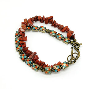 Red jasper chips and turquoise and gold enameled beads in this stunning bracelet and earring set