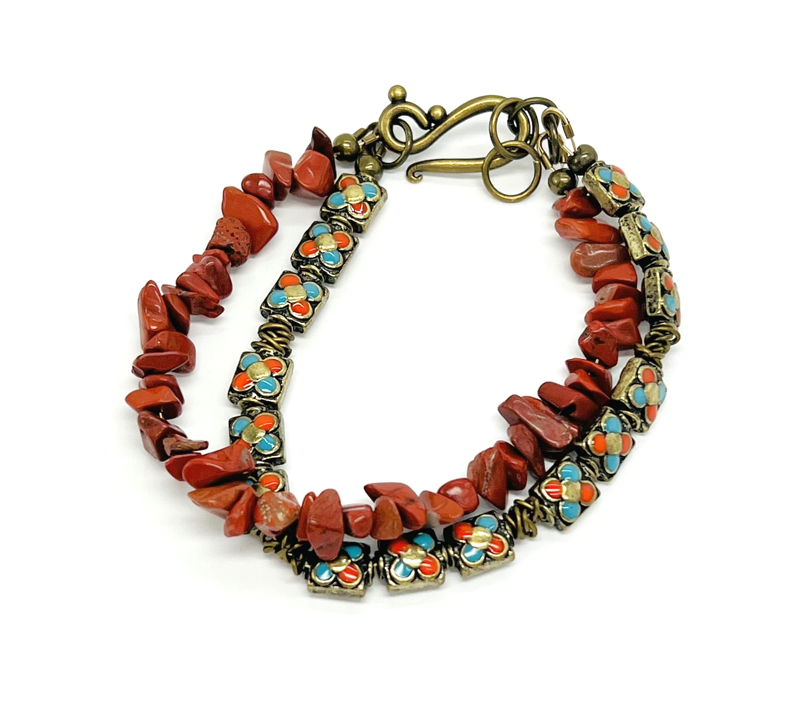 Red jasper chips and turquoise and gold enameled beads in this stunning bracelet and earring set