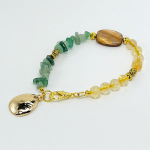 Bracelet and earring set with semiprecious green aventurine and yellow citrine with gold accents and pineapple charms