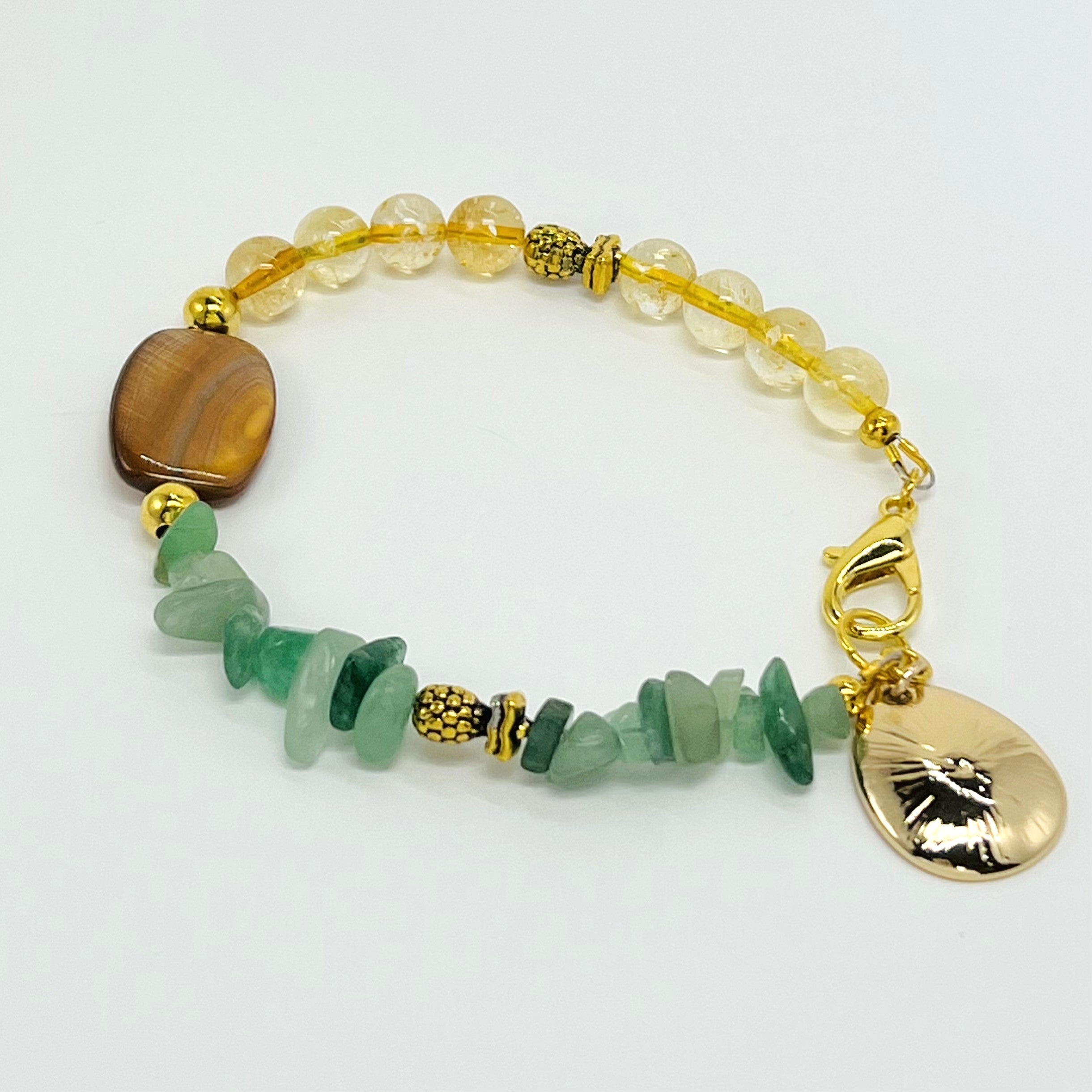 Bracelet and earring set with semiprecious green aventurine and yellow citrine with gold accents and pineapple charms