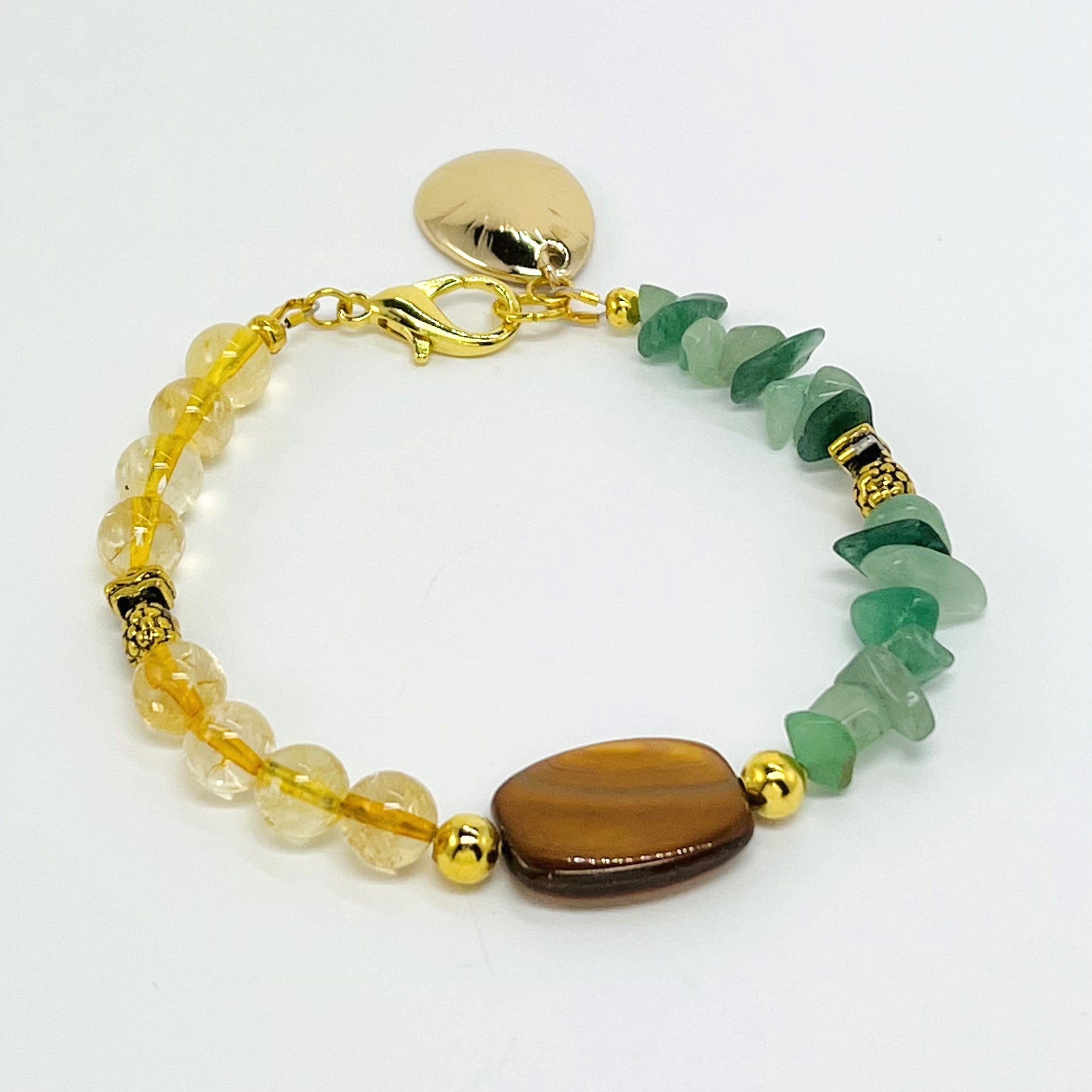 Bracelet and earring set with semiprecious green aventurine and yellow citrine with gold accents and pineapple charms