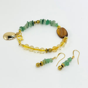 Bracelet and earring set with semiprecious green aventurine and yellow citrine with gold accents and pineapple charms