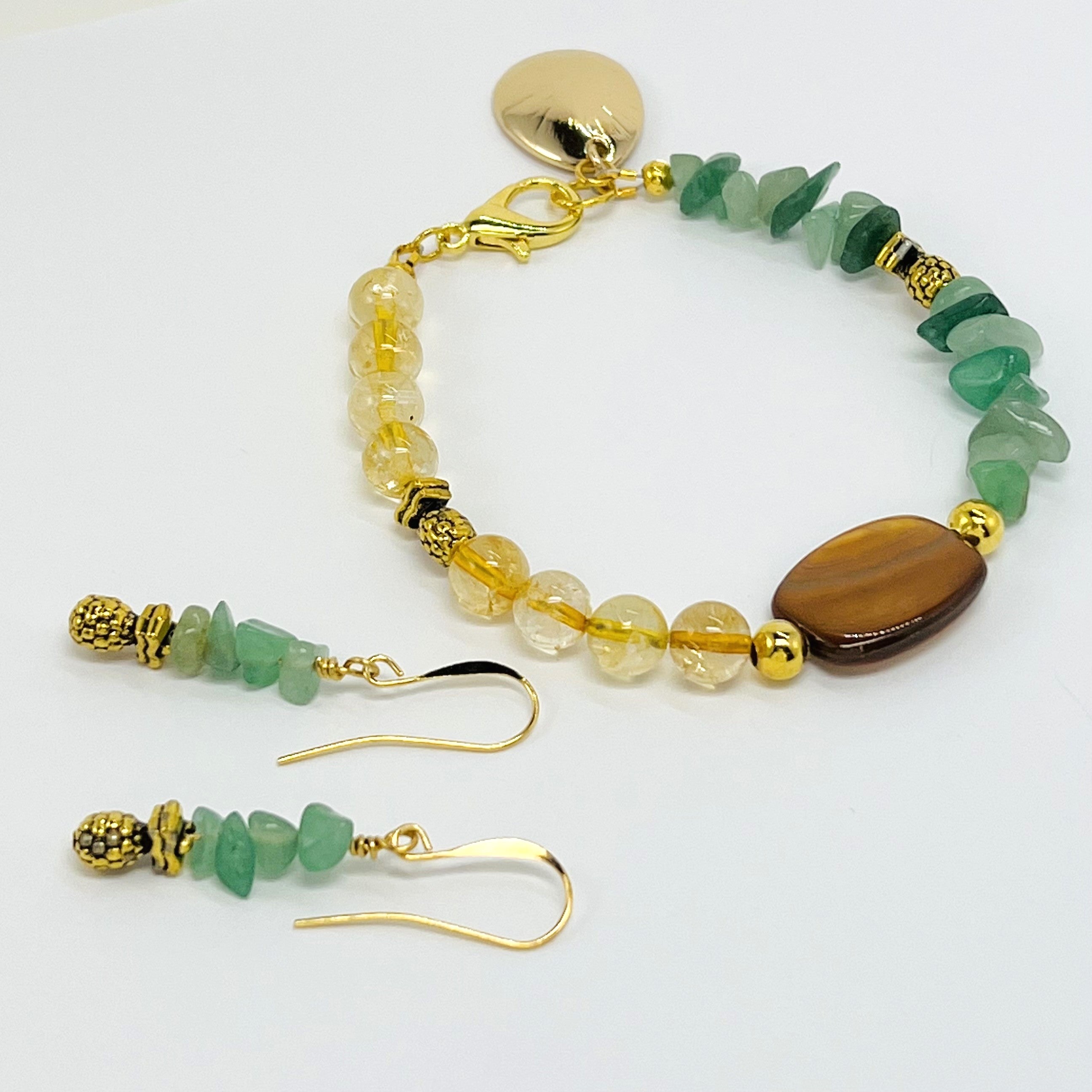 Bracelet and earring set with semiprecious green aventurine and yellow citrine with gold accents and pineapple charms