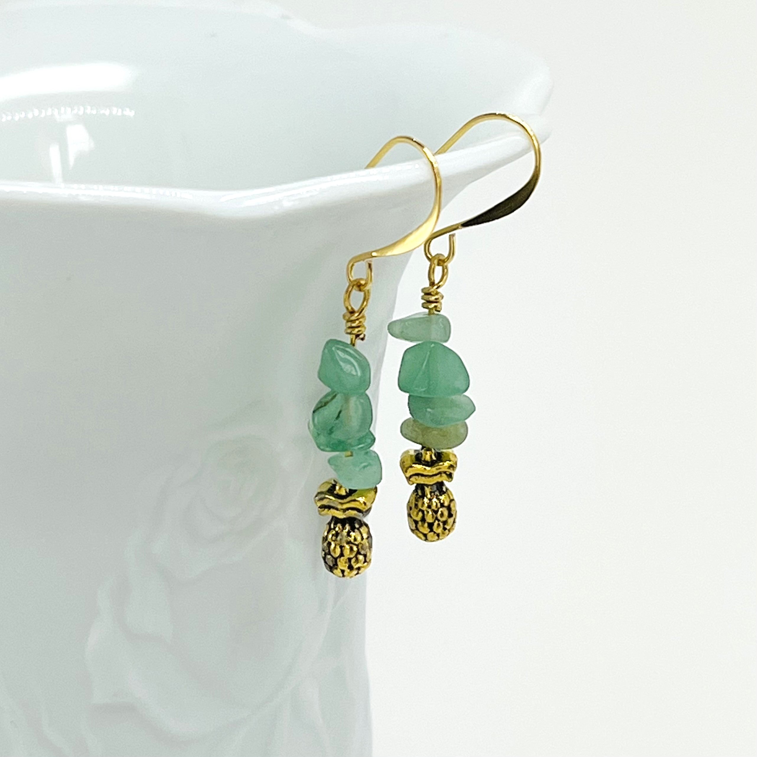 Bracelet and earring set with semiprecious green aventurine and yellow citrine with gold accents and pineapple charms