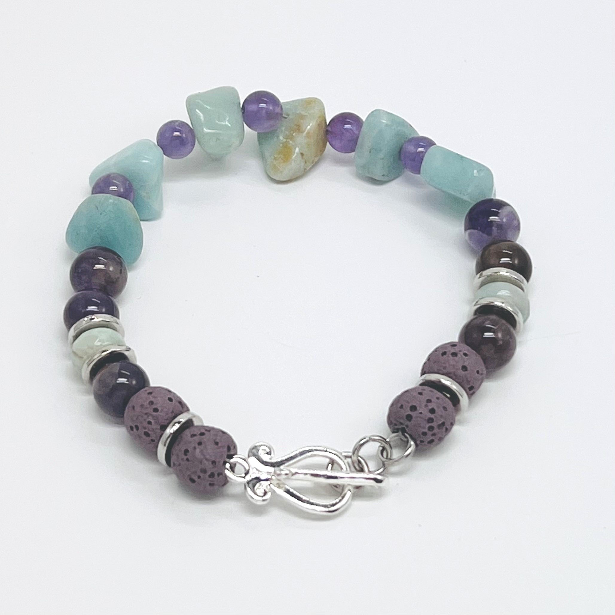 Bracelet of semiprecious amazonite and amethyst with lava beads for your personal essential oil