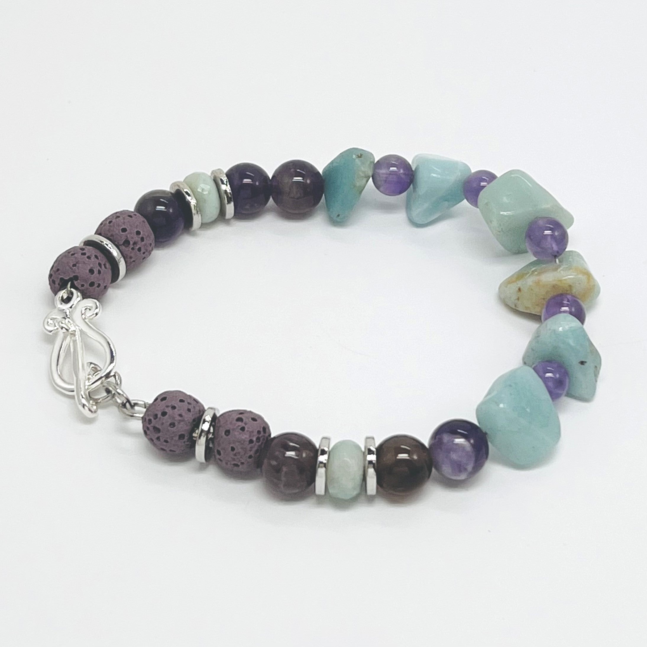 Bracelet of semiprecious amazonite and amethyst with lava beads for your personal essential oil