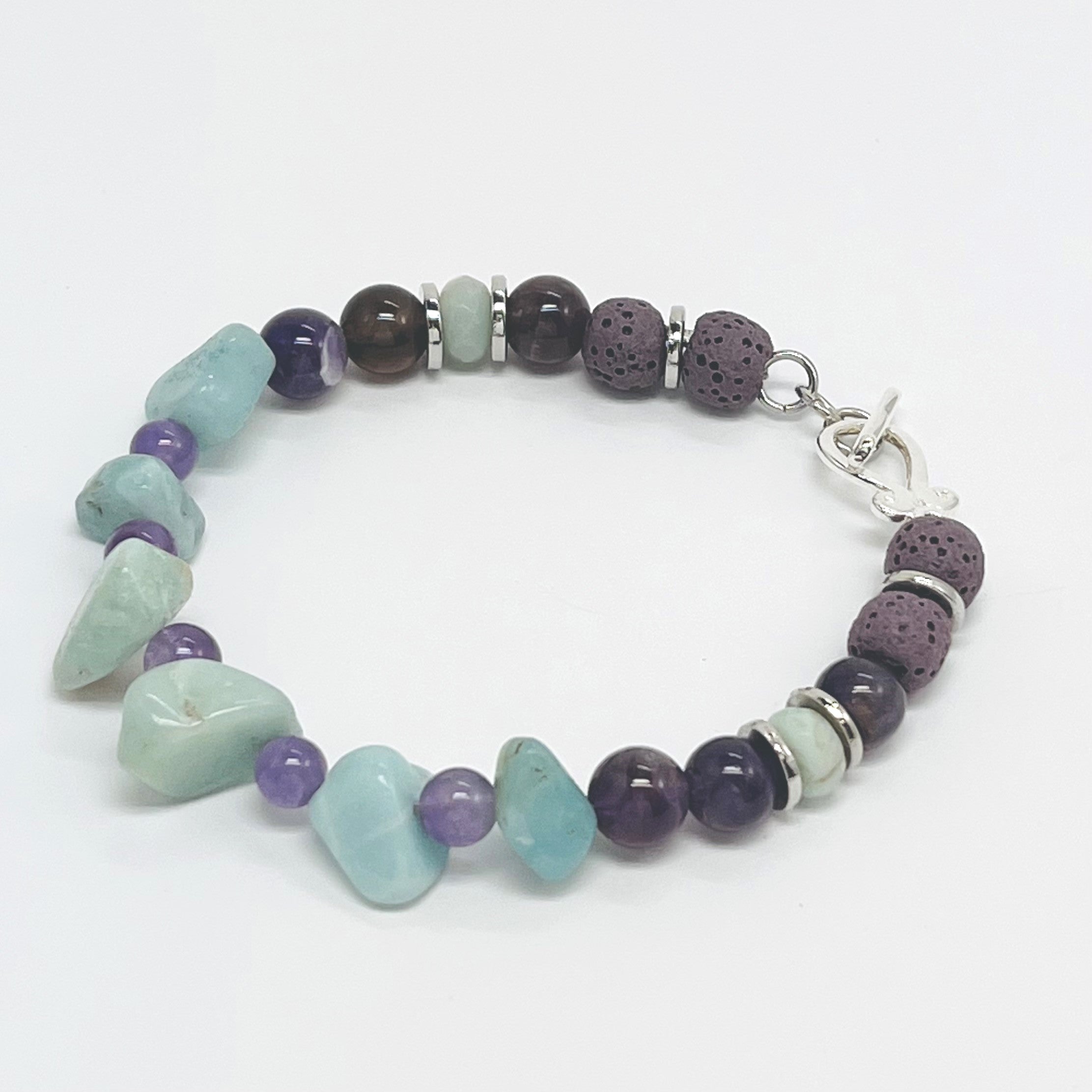 Bracelet of semiprecious amazonite and amethyst with lava beads for your personal essential oil