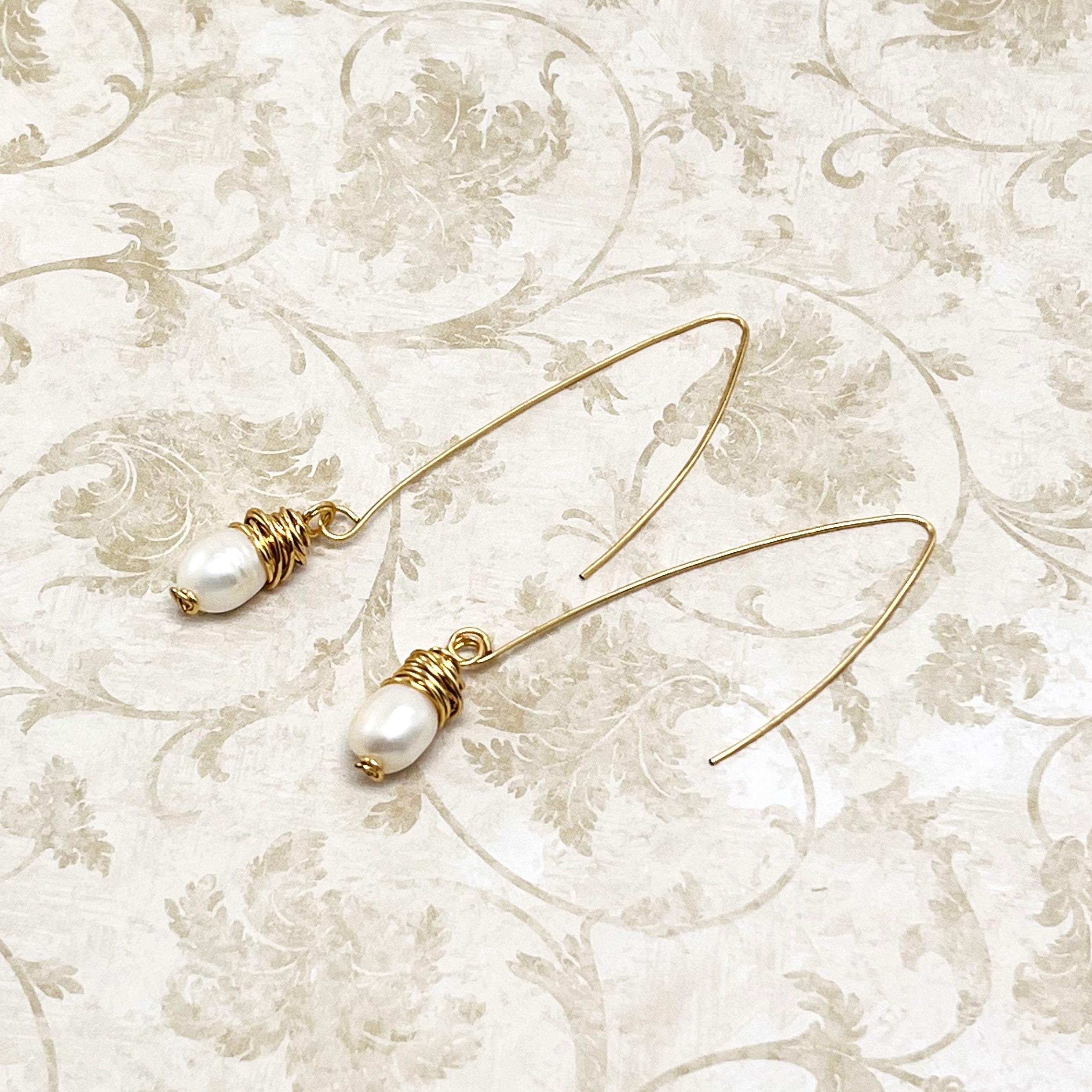 Long elegant fresh water pearl earrings with gold accents