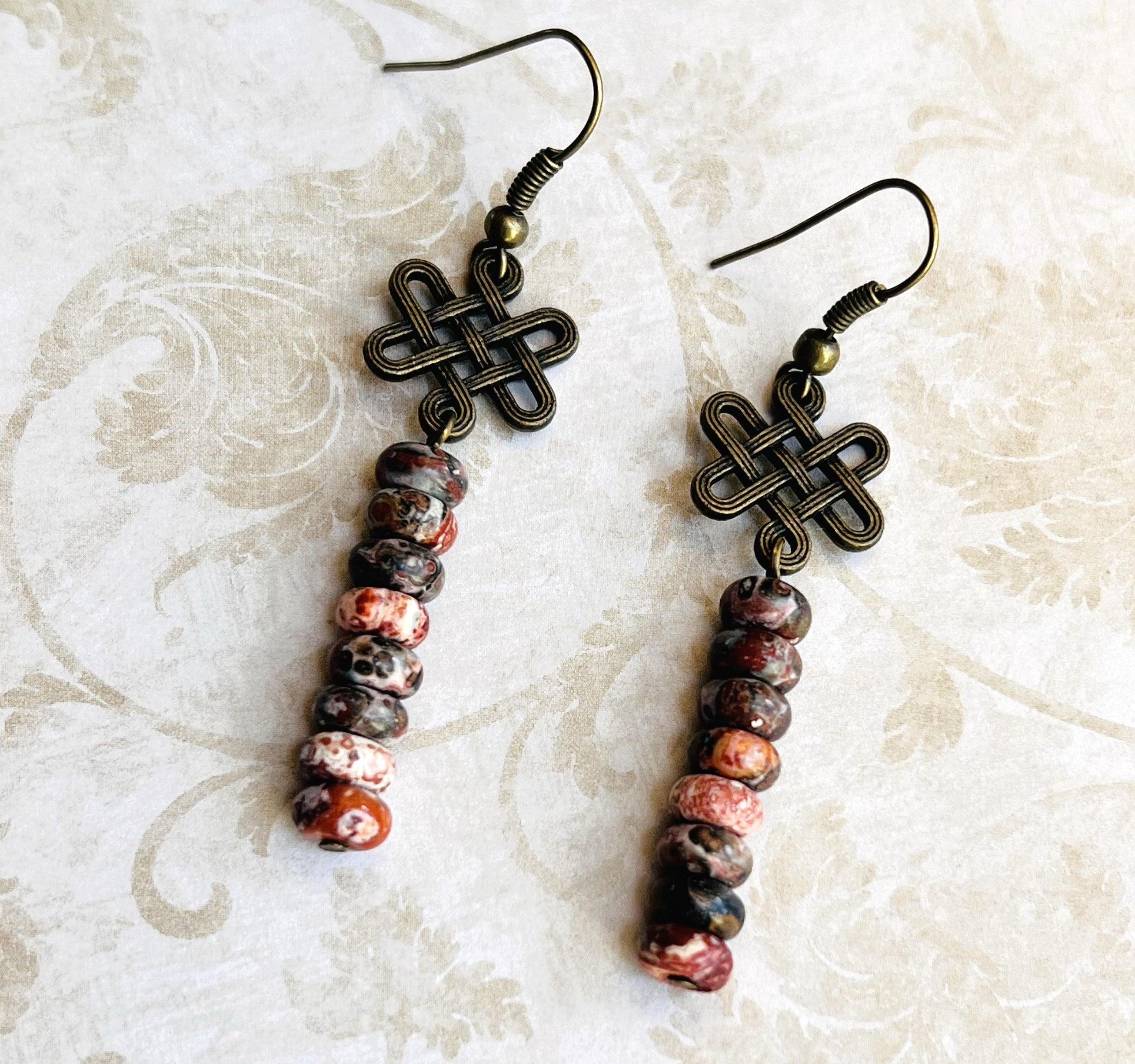 Boho style earrings of lovely Leopard Jasper gemstones and antique brass Celtic love knot