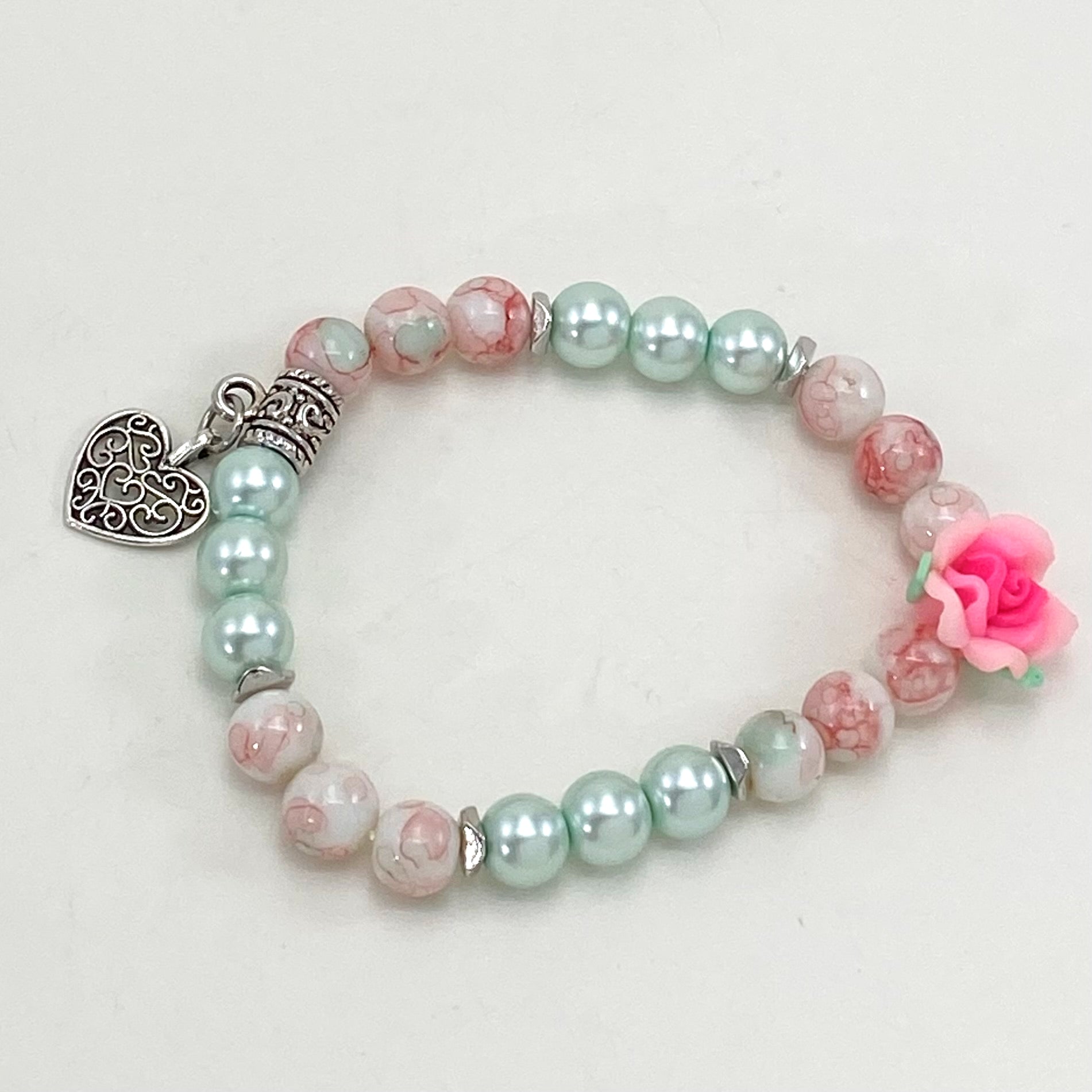 Romantic marbled pink and mint glass beaded stretch bracelet