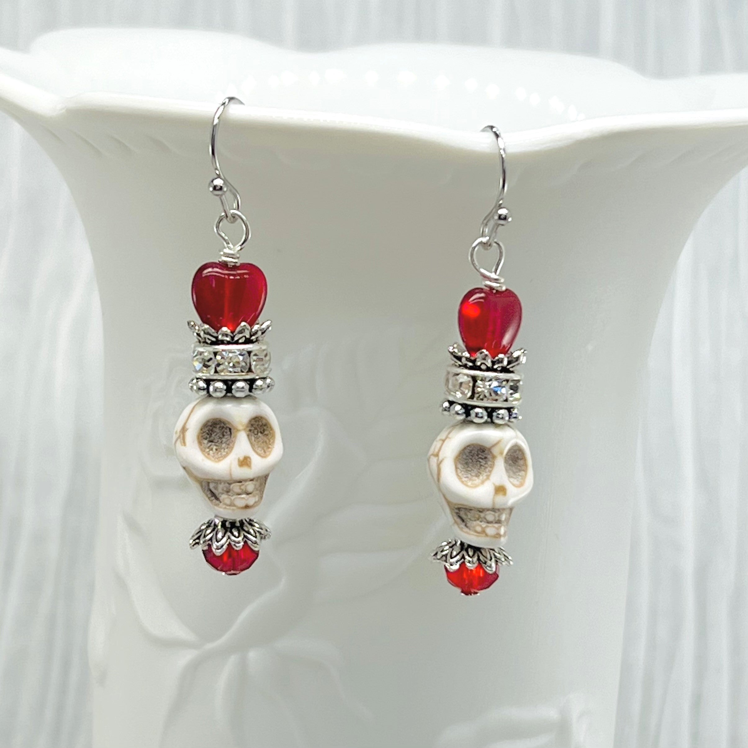 Skull earrings in white Wagnerite and red Czech glass heart beads