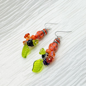 Skull earrings, orange, green, purple and black with rhinestone rondels and silver accents