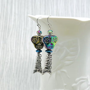 Spooky iridescent glass skull earrings with silver accents