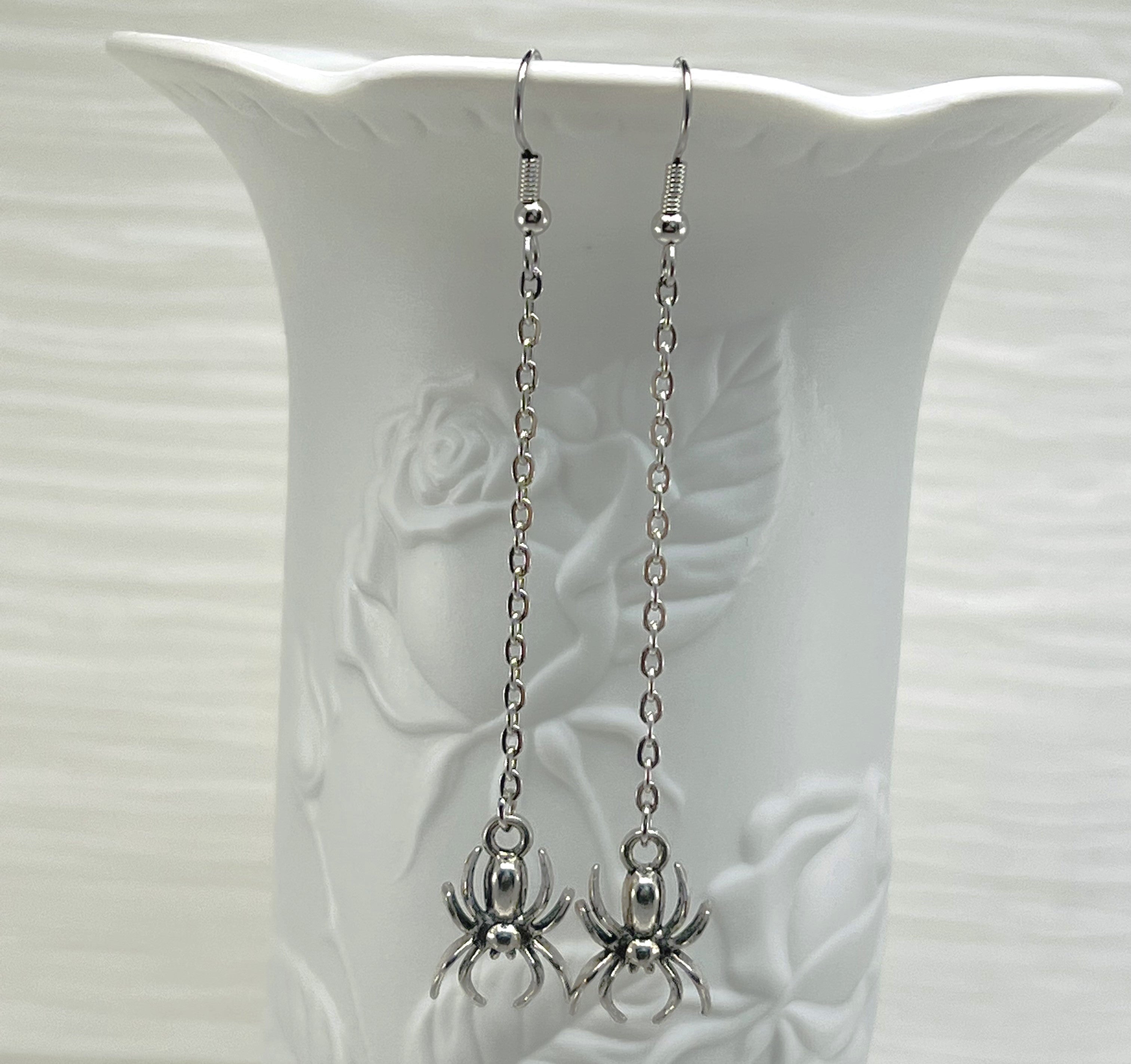 Creepy crawly long silver spider earrings