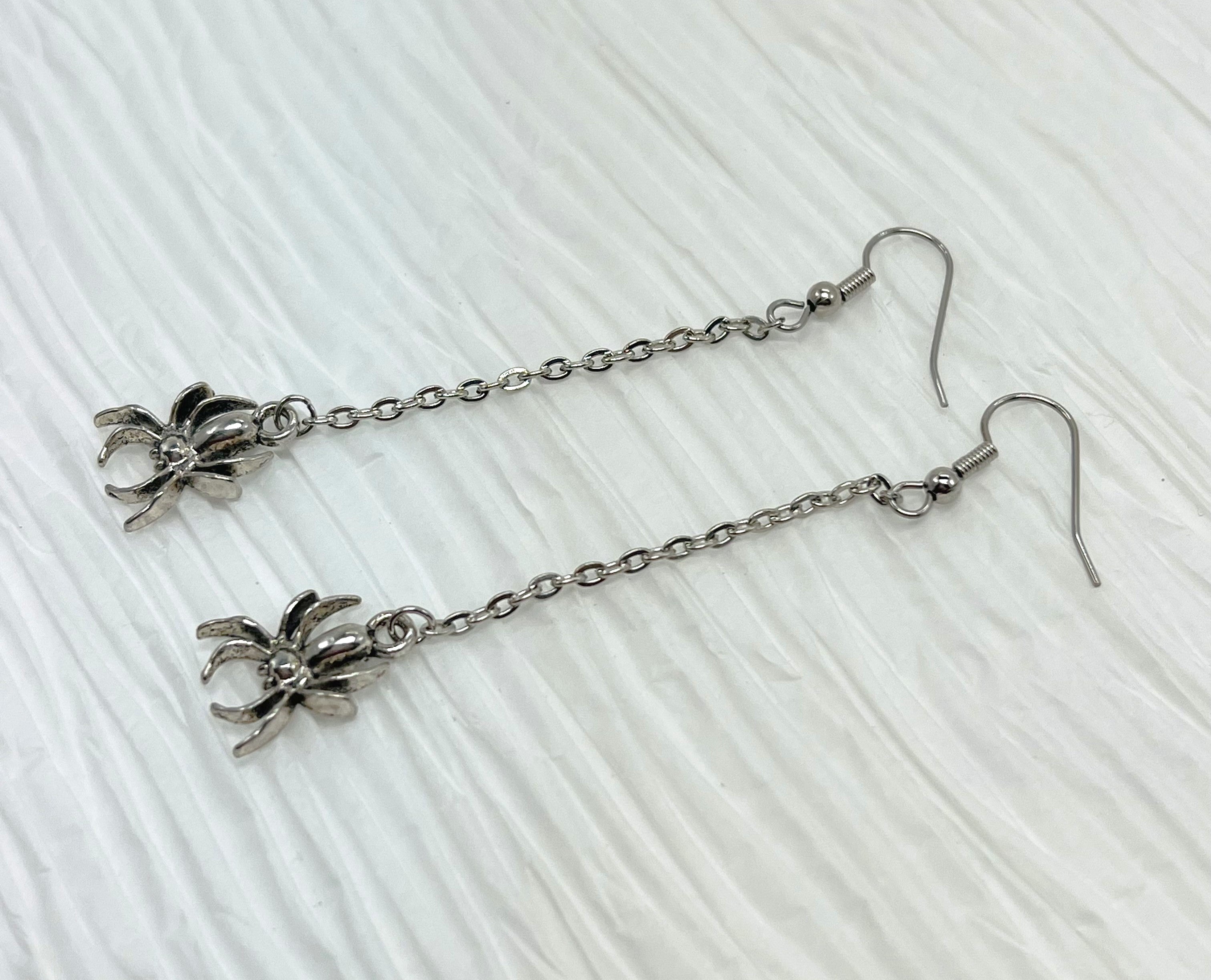 Creepy crawly long silver spider earrings