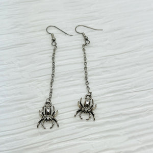 Creepy crawly long silver spider earrings