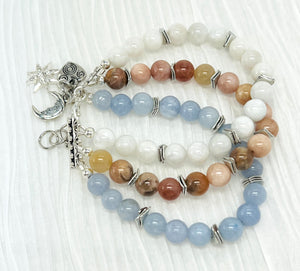 Mystical gemstones aquamarine, moonstone and sunstone combine in a calming balance of color and meaning