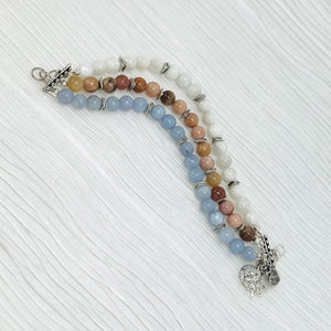 Mystical gemstones aquamarine, moonstone and sunstone combine in a calming balance of color and meaning