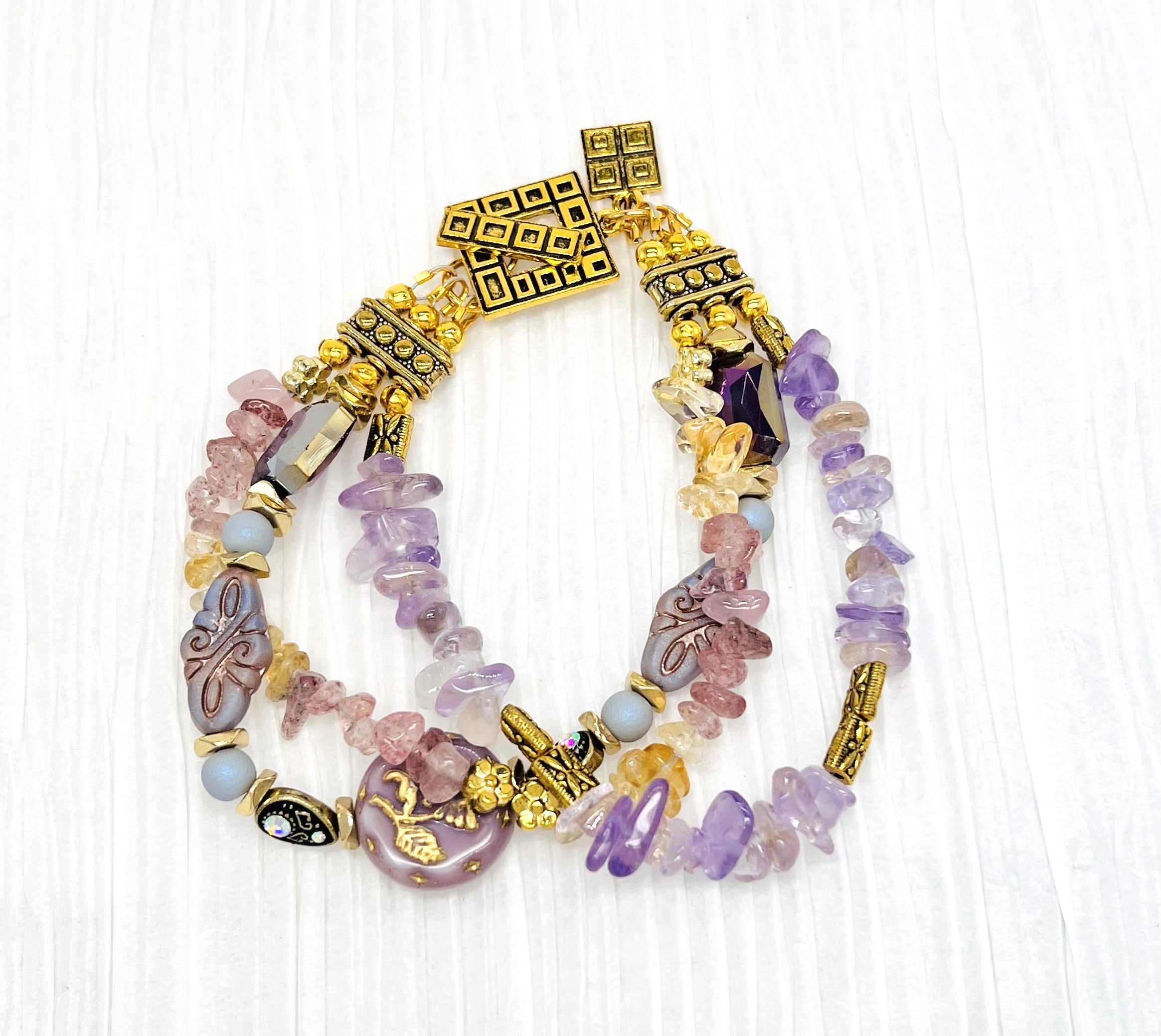 Czech glass and gemstones combined in warm yellow citrine, lavender ametrine and strawberry quartz with gold metal elements