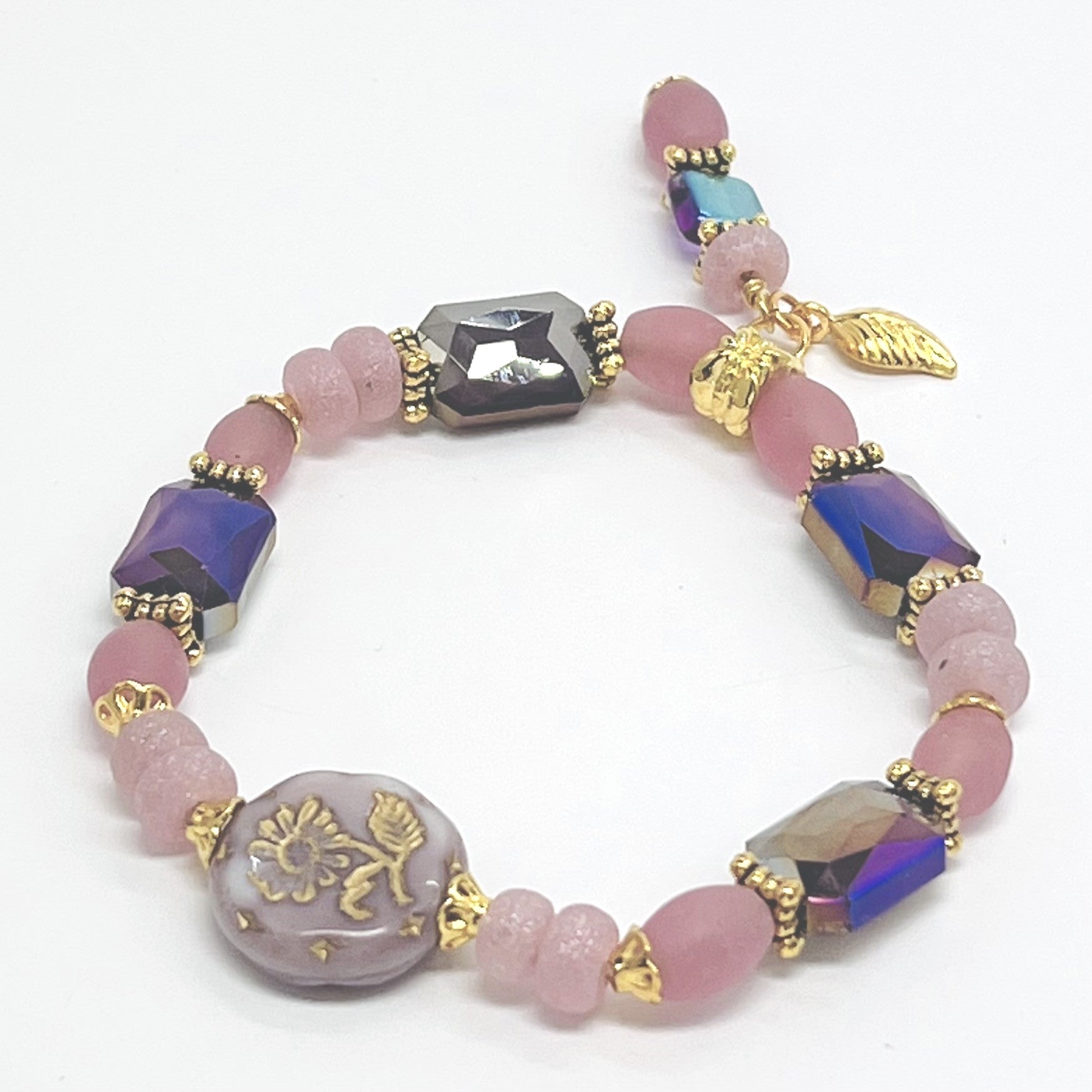 Romantic bracelet and earring set in pink and purple Czech glass with gold plated accents